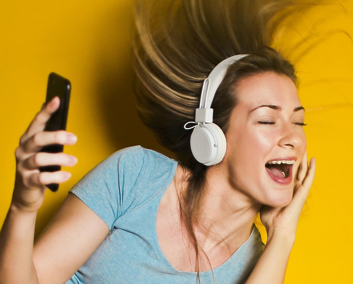 Woman with headphones — original